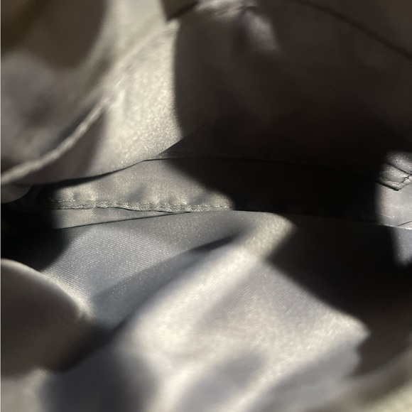 Grey cloth coach wristlet with leather accents and strap. Silver color. - Picture 3 of 11